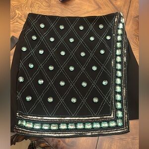 Bebe black skirt with emerald colored crystals nwt size 8